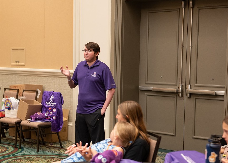 Children from the Duda family gathering holding Purple Playas coping kits